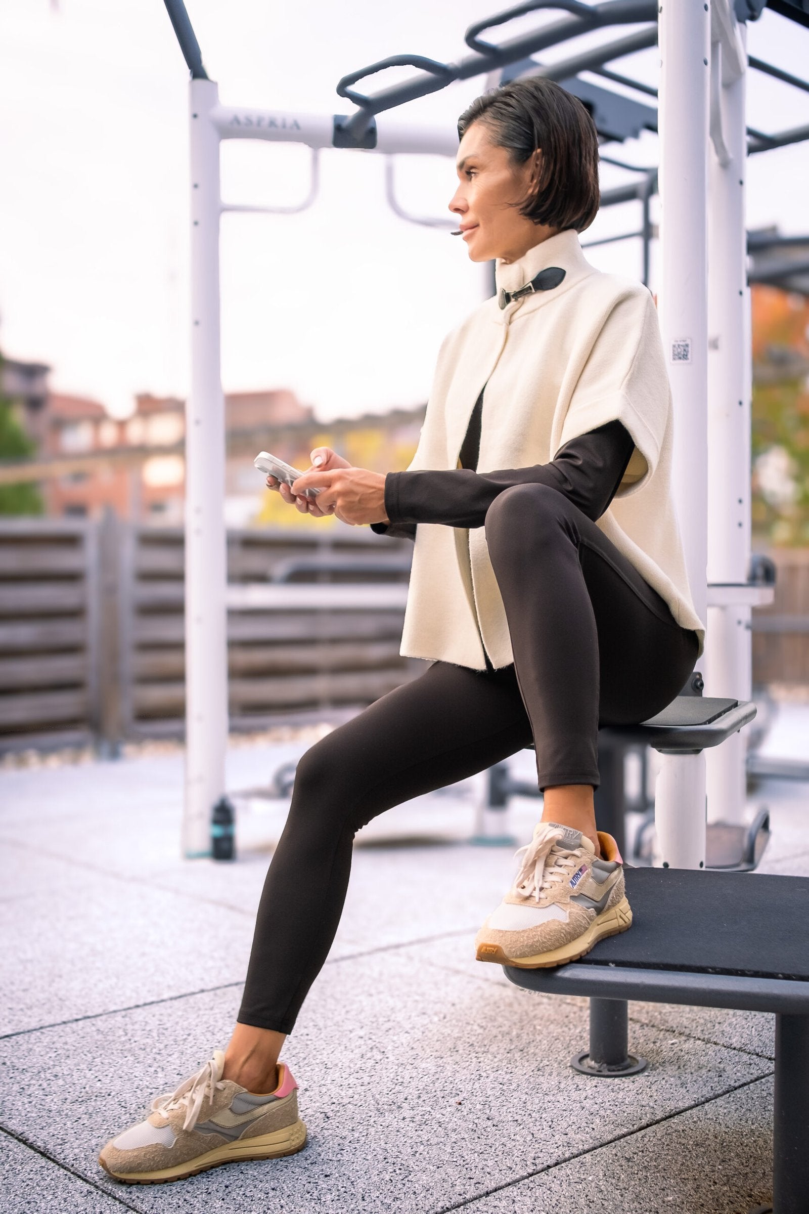 Women’s long cardigan with front closure styled with trousers, versatile knitwear for modern wardrobe – Bonheurs Fashion