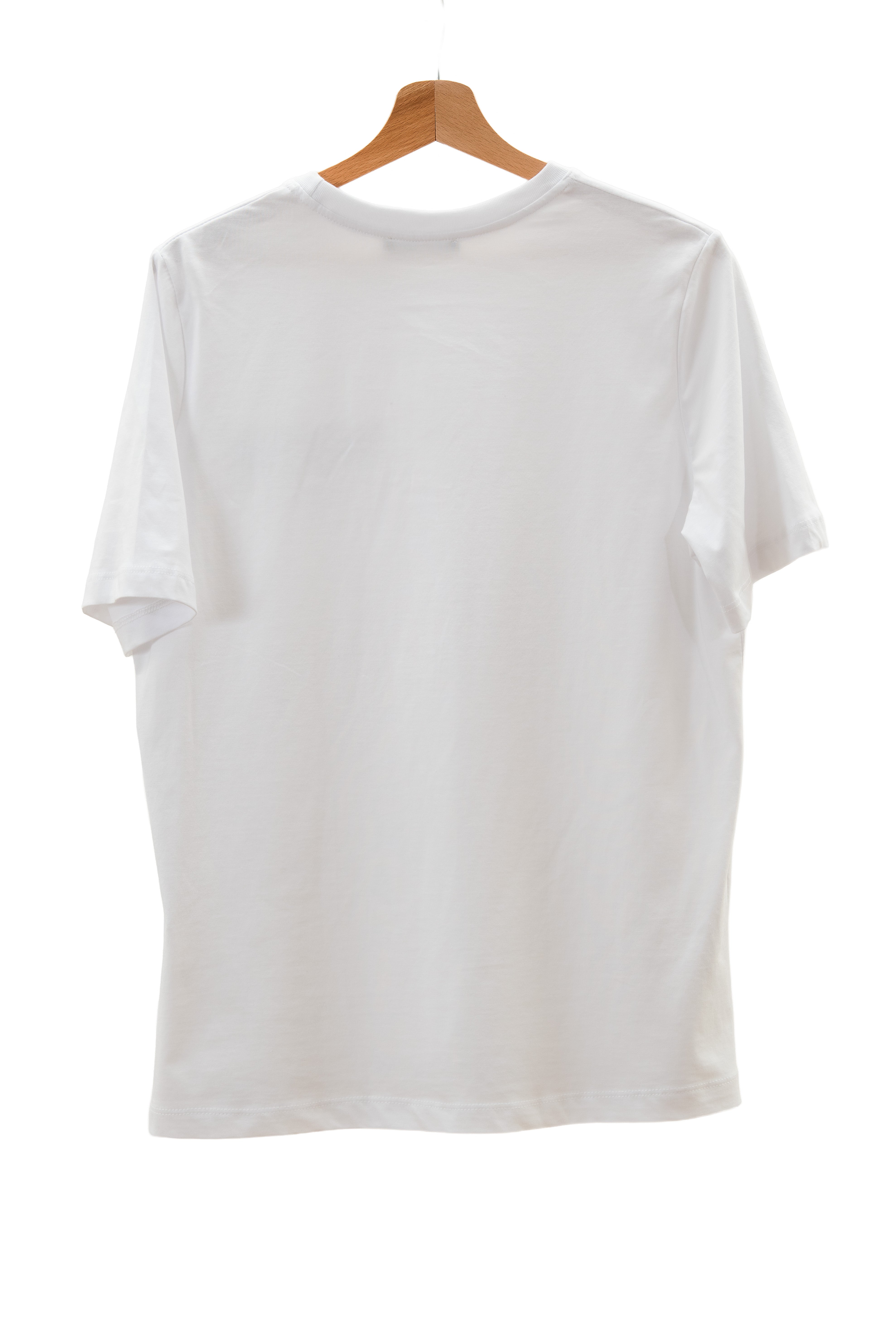 White t-shirt on a wooden hanger against a white background