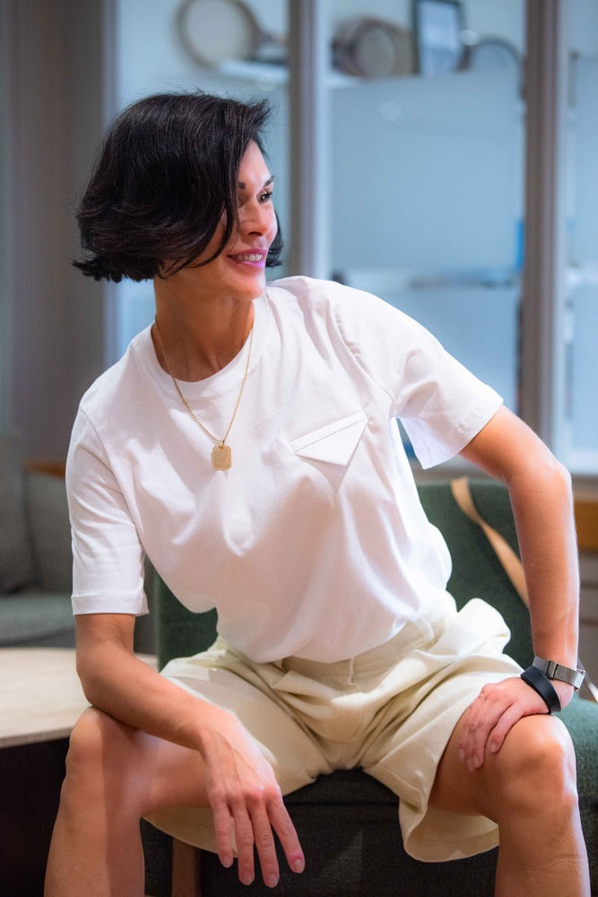 white women’s T-shirt with embroidered triangle