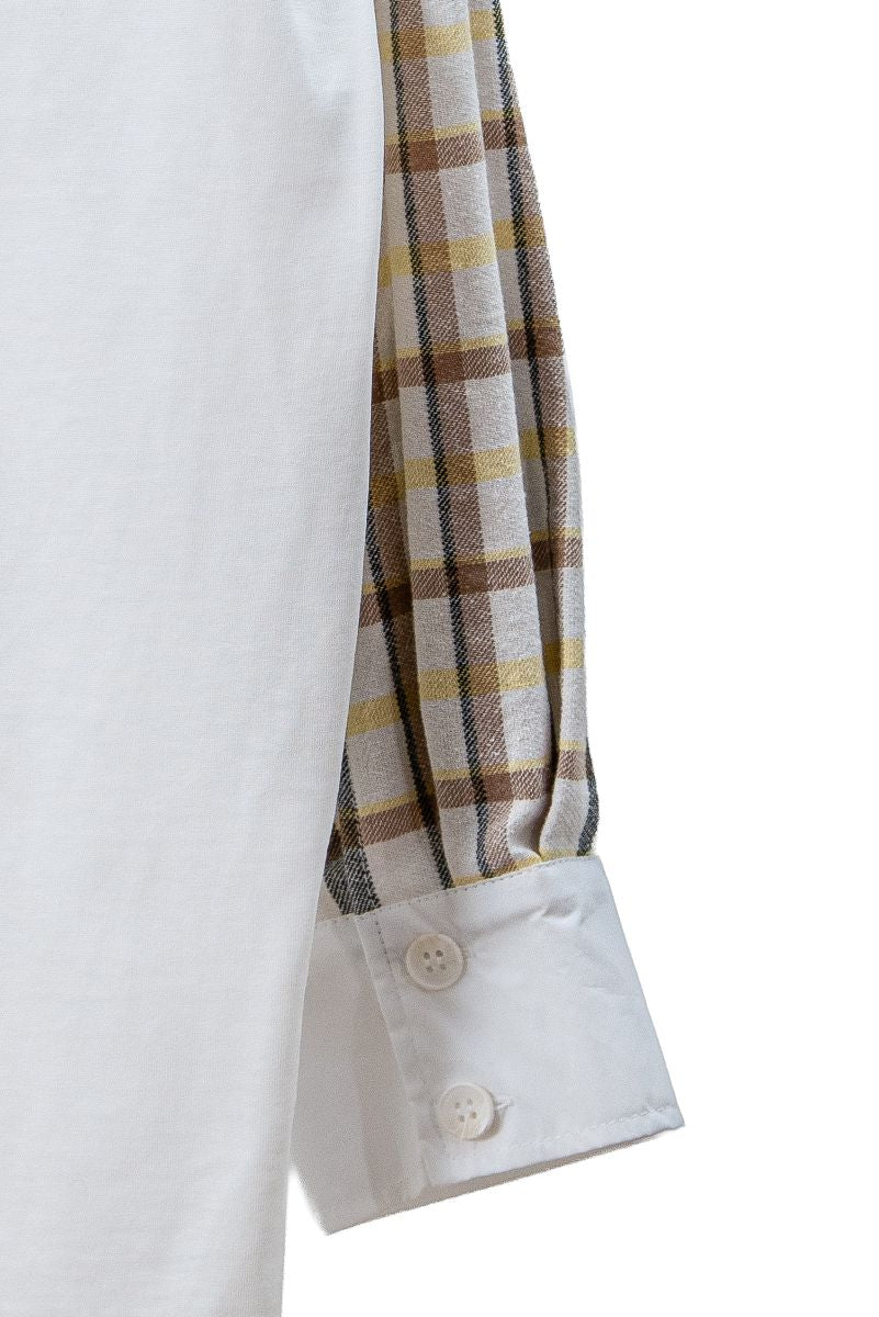 White shirt with plaid cuff on a white background